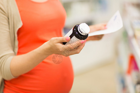 怀孕,医学,药剂学,保健人的密切孕妇与处方药物罐阅读标签药房图片