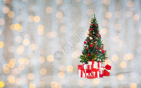 庆祝,寒假广告诞树与礼物诞帽混凝土墙背景背景图片