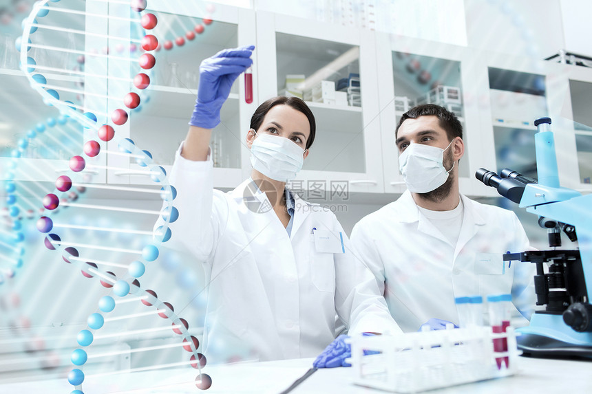 科学,化学,技术,生物学人的轻的科学家与试管显微镜临床实验室的DNA分子结构的研究图片