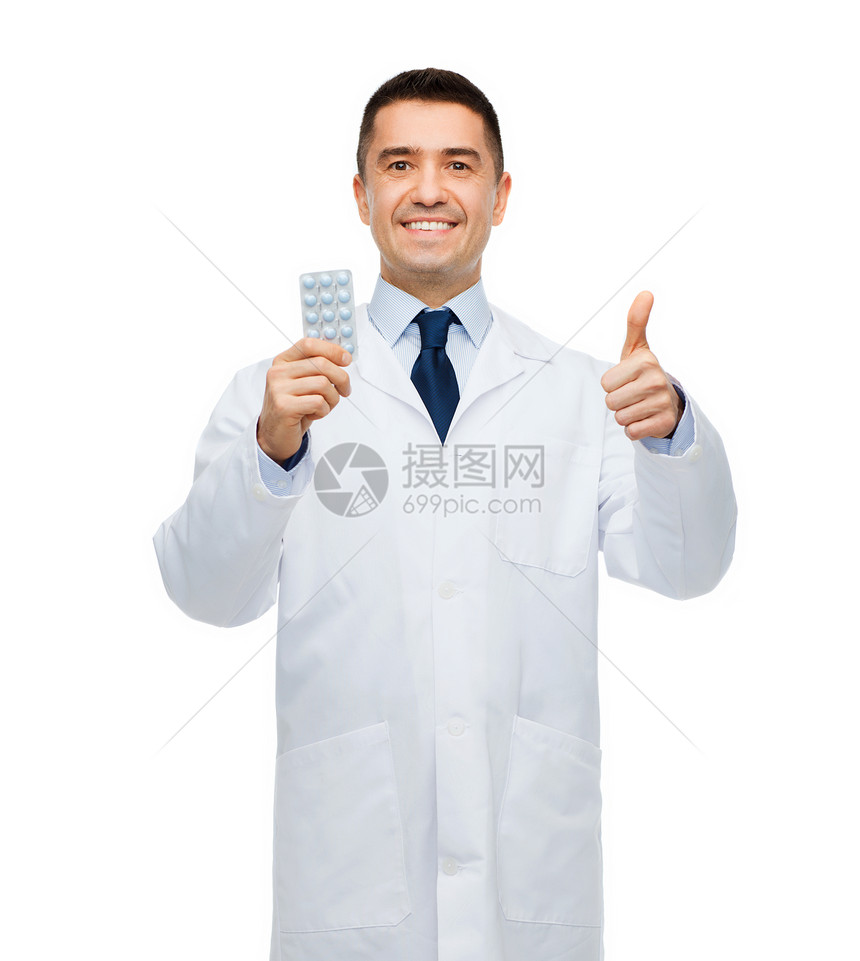 医疗保健,职业,人,手势医学微笑的男医生穿着白色外套,药片大拇指图片