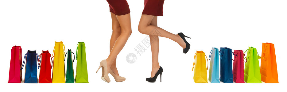 人,销售折扣妇女穿着红色短裙高跟鞋与购物袋图片