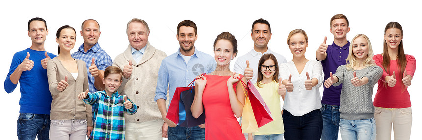 手势销售购物人的群微笑的男人女人孩子竖大拇指,着购物袋图片