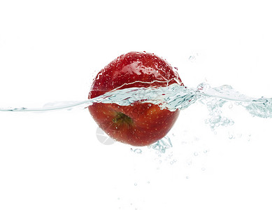 水果,食物健康的饮食新鲜苹果掉落蘸水溅白色背景上图片