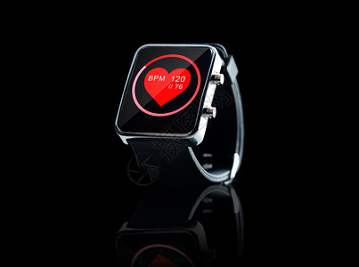 现代技术,象,保健媒体黑色智能手表红色心跳图标屏幕上图片