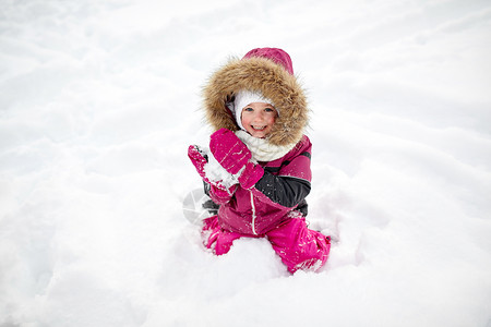 童,时尚,季节人的快乐的孩子女孩穿着冬天的衣服玩雪图片