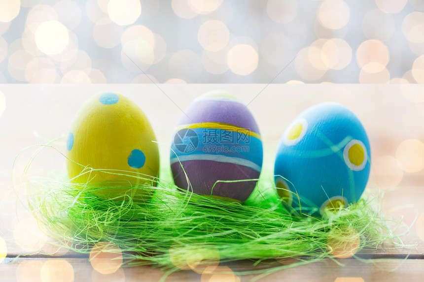 复活节,假日,传统象彩色复活节鸡蛋装饰草木表图片