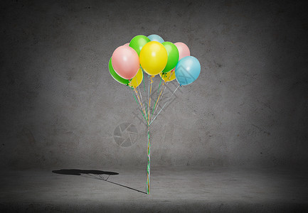 假期,生日派堆五颜六色的氦气球混凝土房间背景上背景
