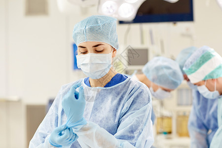 外科,医学人的外科医生戴着医用手套手术室医院图片