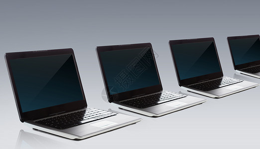 技术广告笔记本电脑与空白黑屏灰色背景带空白黑屏的笔记本电脑图片