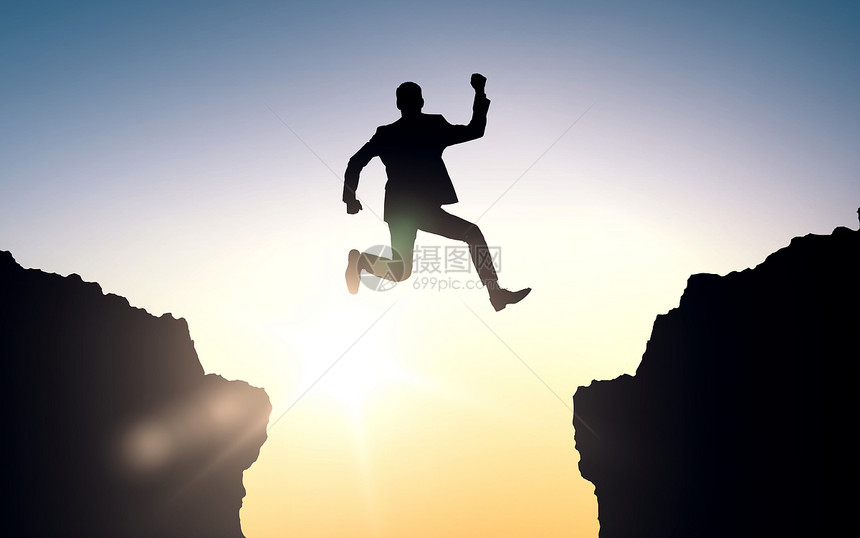 商业,人,成功,成就教育理念快乐的商人跳跃两个岩石图片