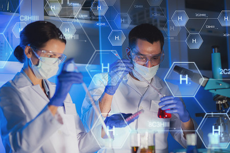 科学化学生物学医学人的用吸管烧瓶临床实验室氢化学配方进行测试研究的轻科学家的特写背景图片