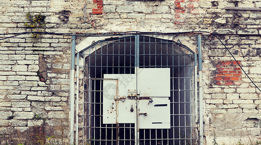 监禁,建筑旧监狱大门背景图片