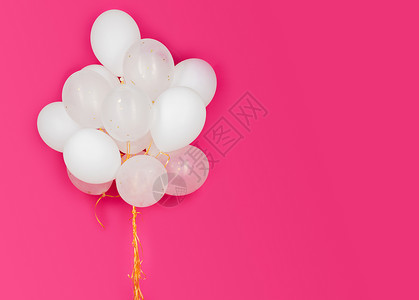 节日,生日,派装饰膨胀的白色氦气球粉红色的背景图片
