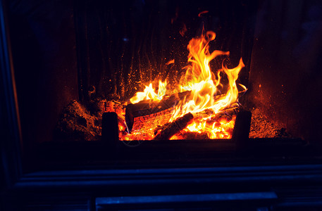 集中火焰光效加热,温暖,火舒适的燃烧的壁炉家里背景