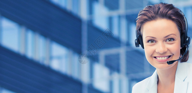 商业,人,技术沟通快乐女帮助热线运营商耳机城市办公楼背景背景图片