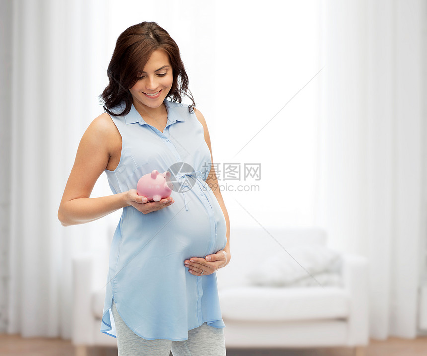 怀孕,母亲,财务,储蓄人的快乐的孕妇与储蓄罐家庭房间的背景图片