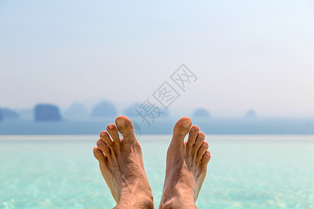 暑假,海滩,旅游,休闲身体护理的特写男的脚海上天空图片
