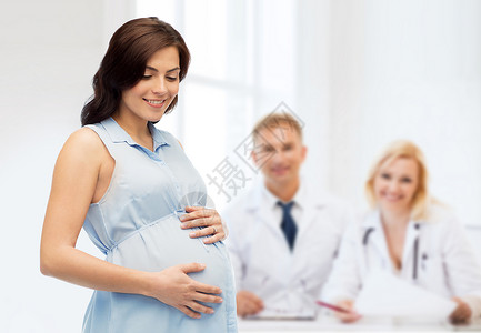怀孕,母亲,人,医学生育快乐的孕妇触摸她的大肚子妇产医院的背景背景图片