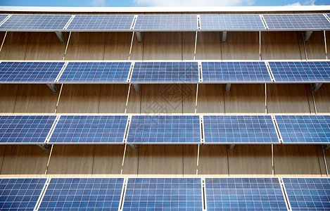 能源电力环境生态建筑立上的太阳能电池板图片