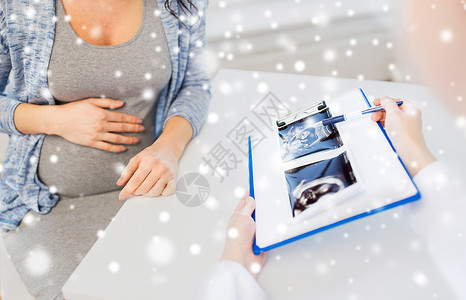 怀孕,医学,医疗,冬季人们的密切妇科医生超声图像剪贴板上孕妇医院的雪图片