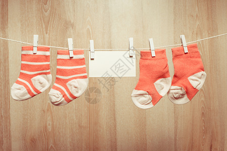 女婴袜子附绳子空白卡上女婴袜子图片