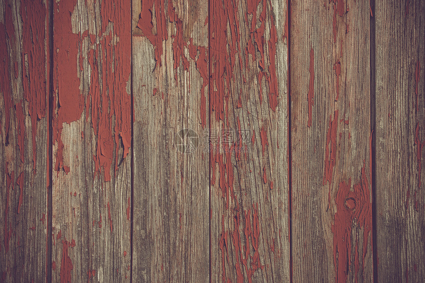 红色油漆剥落旧木板图片