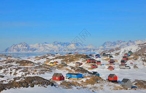 因纽苏克Kulusuk村格陵兰的五颜六色的房子背景