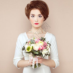 三月八日女王节手里着花的女人鲜花春天新娘三月八日时尚照片背景