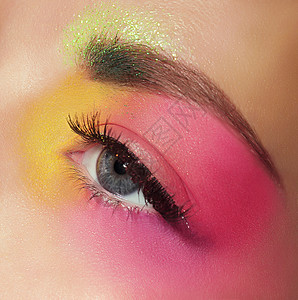 化妆品睫毛膏女人的眼睛用五颜六色的化妆图片