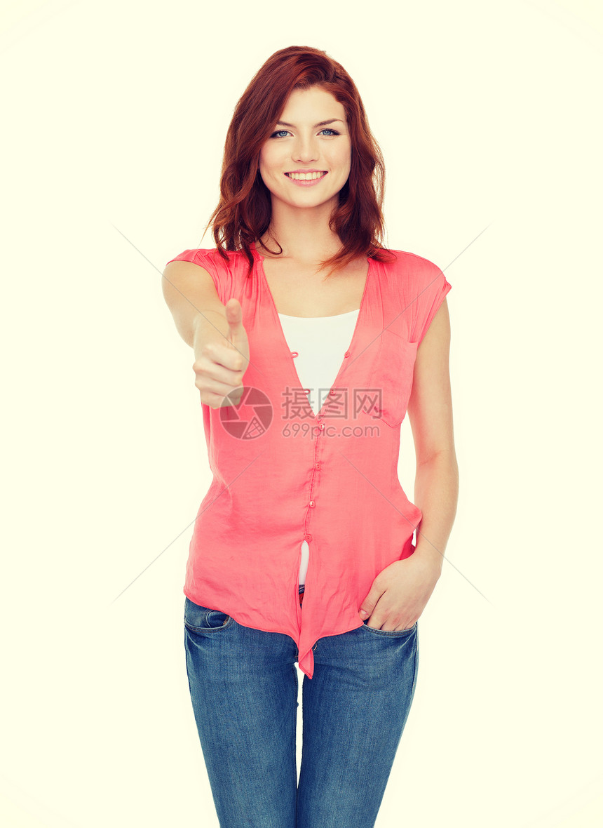幸福,手势人的微笑的十几岁女孩穿着休闲服,竖大拇指图片