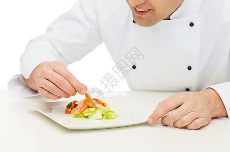 烹饪,职业,高级美食,食物人的接近快乐的男厨师烹饪装饰菜图片