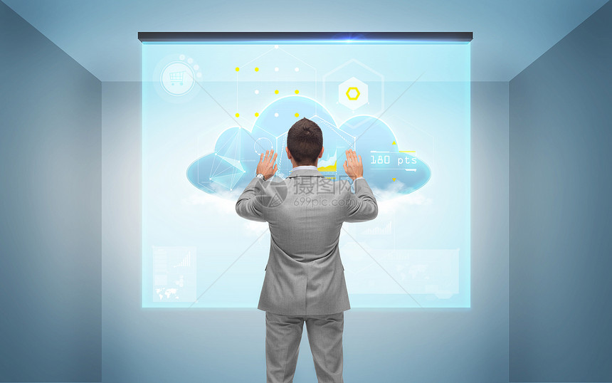 商业,人,技术云计算商人与虚拟屏幕灰色的房间背景后图片