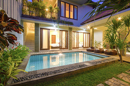 高端房地产展板带游泳池的热带别墅背景