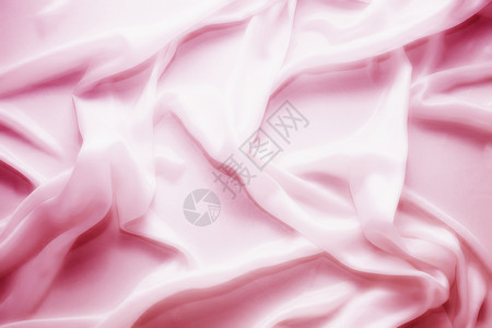 细腻的粉红色缎子丝波紧紧地贴着图片