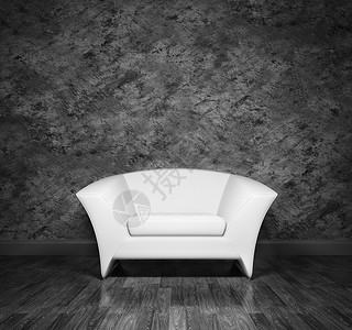 黑色灰泥墙上的现代白色扶手椅背景图片