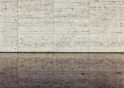 米色纹理钙华墙反射水中巴塞罗那亭图片