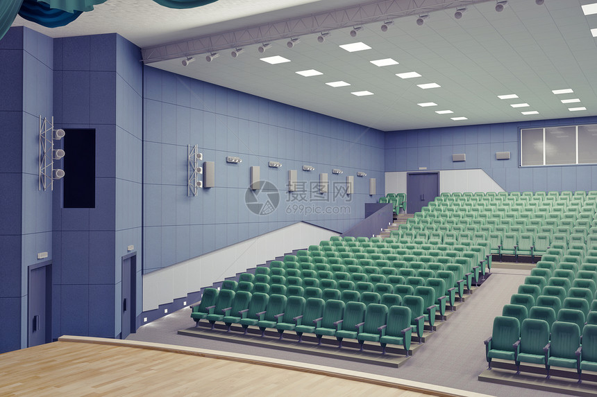 现代剧院大厅的空绿色扶手椅图片