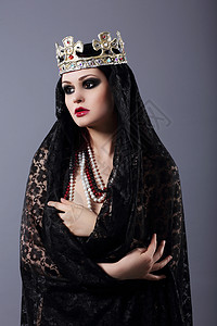 哈里比丹国民报巫术穿着老式衣服皇冠的女人背景