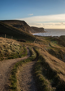 海岸小径景观日出侏罗纪海岸英格兰图片