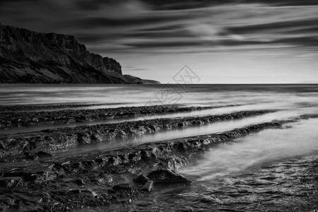 惊人的黑白海景海岸线岩石海岸日落图片