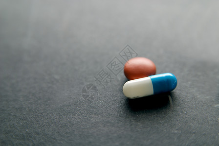 药丸pill的名词复数药片口服避孕药讨厌鬼背景图片