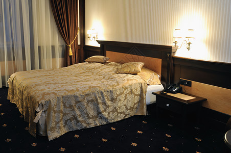现代酒店客房室内公寓,配双人床液晶电视背景图片