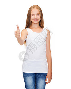 衬衫微笑的十几岁女孩穿着空白的白色衬衫,竖大拇指图片