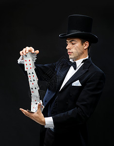 洗牌魔术,表演,马戏,扑克,表演魔术师戴着顶帽表演扑克牌背景