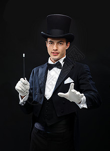 表演,马戏,表演魔术师戴着顶帽子,魔杖表演魔术错觉高清图片素材
