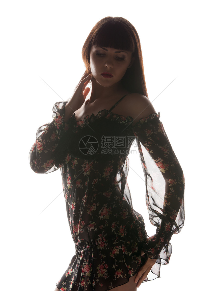 时尚魅力黑色连衣裙女人的剪影背光图片图片
