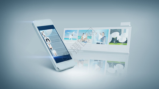 录像技术娱乐活动白色手机与视频屏幕上设计图片