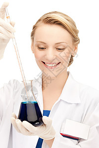 女化学家用化学物质着灯泡的照片图片