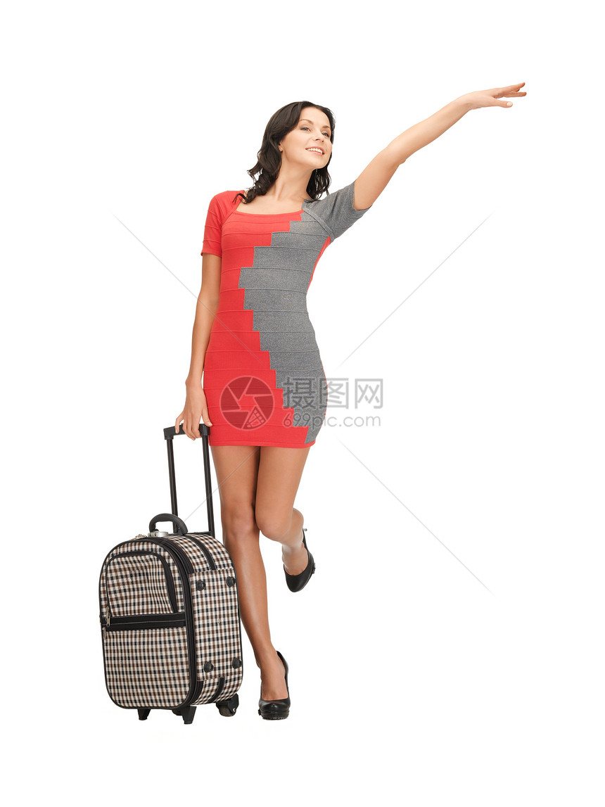 带着手提箱搭便车的女人的明亮照片图片