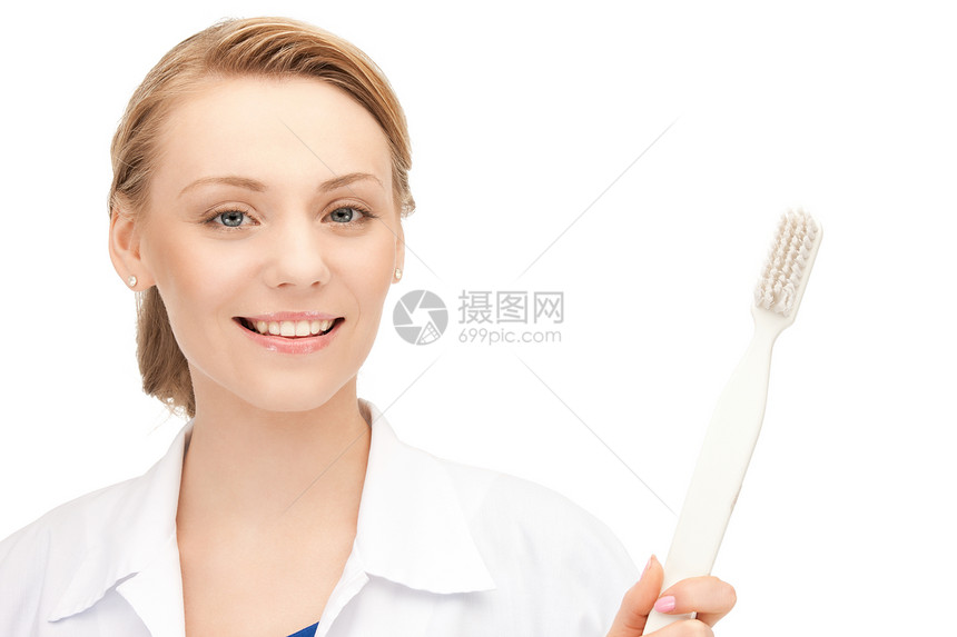 魅力的女医生带牙刷的照片图片